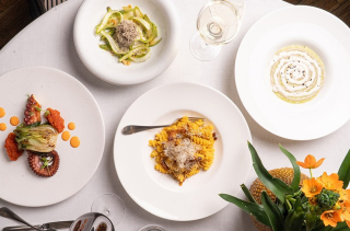 Quatre assiettes de cuisine italienne chez L'Assaggio, à l'hôtel Castille à Paris.